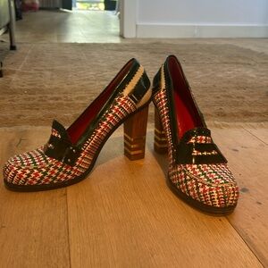 Hillfiger college too. Pink and green heels. Gold and wood detail.